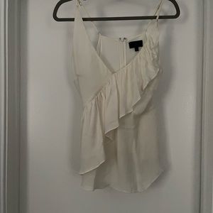 One of my favorite Intermix tops. Great for wearing alone or under anything!